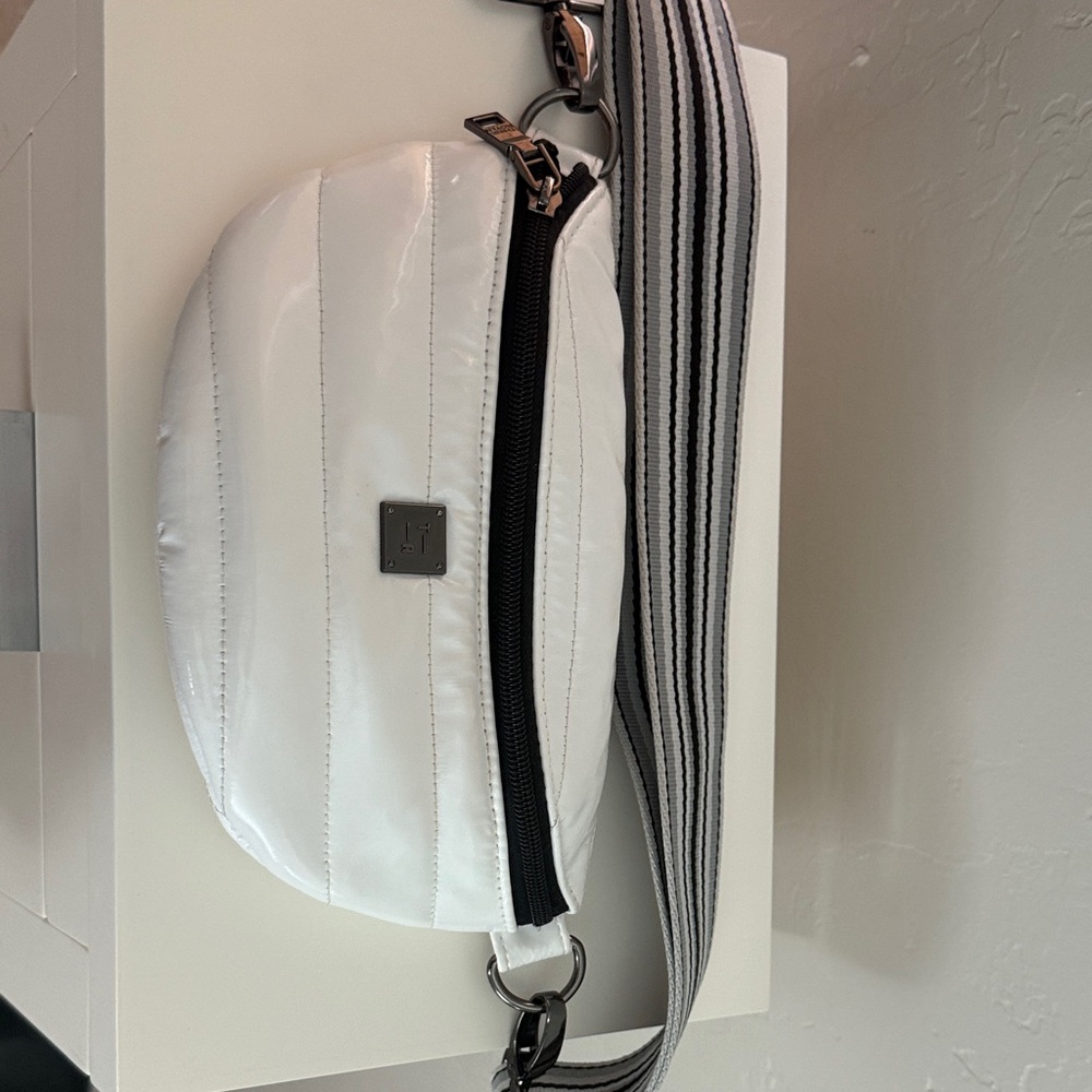 THINK ROYLN White Crossbody Bag with Black and Gray Striped Strap